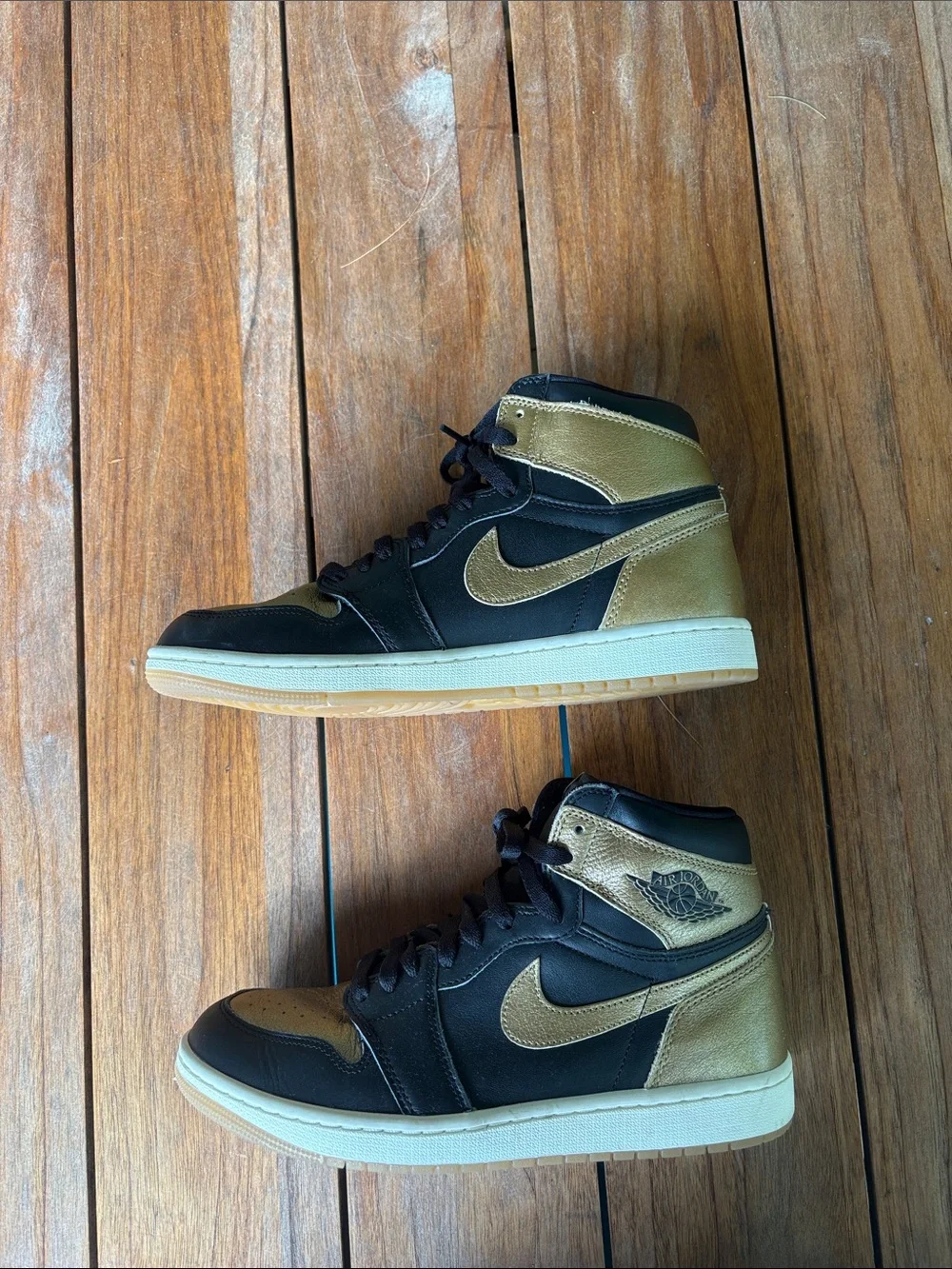 Air Jordan High-Top Sneakers in Black and Gold